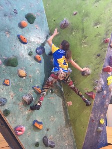 Emily climbing on the black circuit